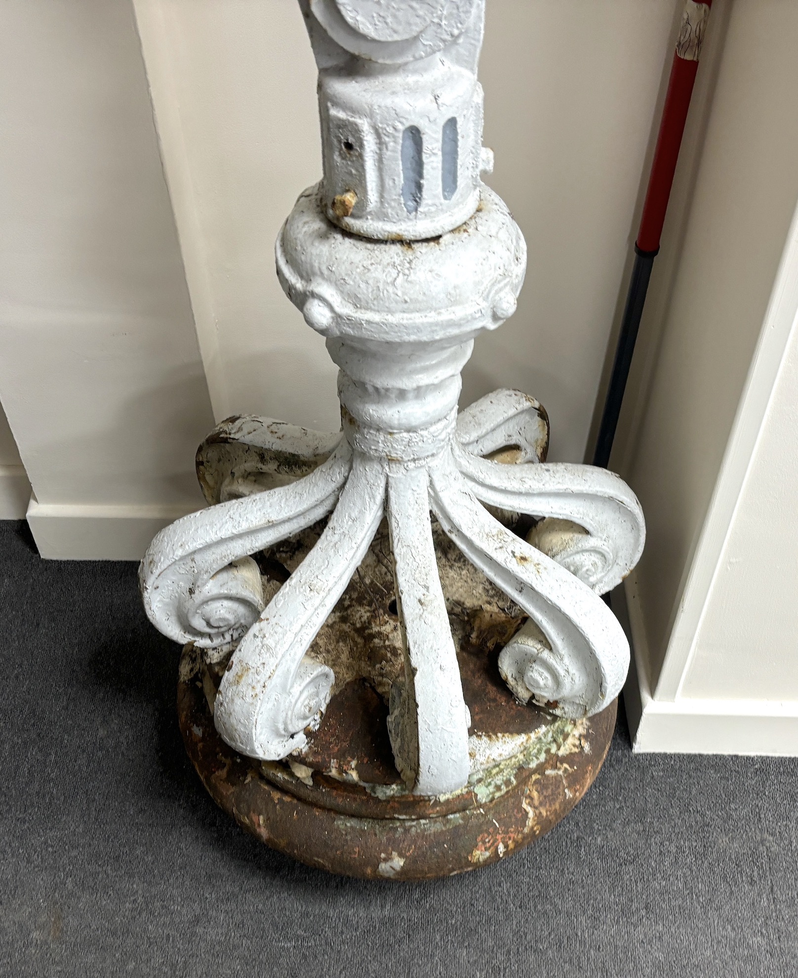 A late 19th/early 20th century cast iron promenade lamp, height 224cm.
